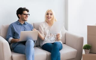 Home buyers researching property risks before purchasing a house