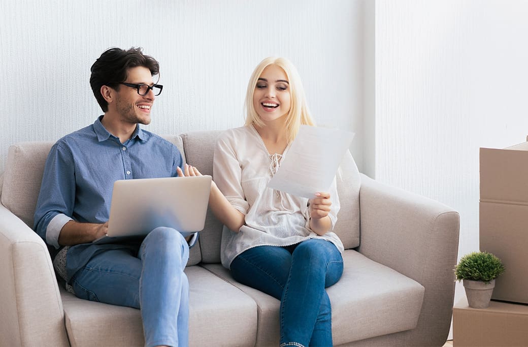 Home buyers researching property risks before purchasing a house